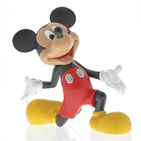 Magical moments statue featuring mickey mouse